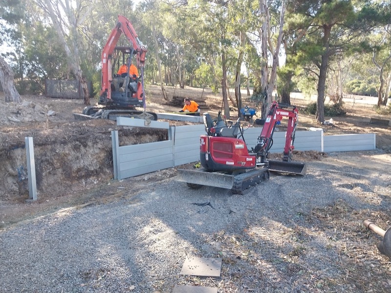 Sure Civil constructing retaining wall